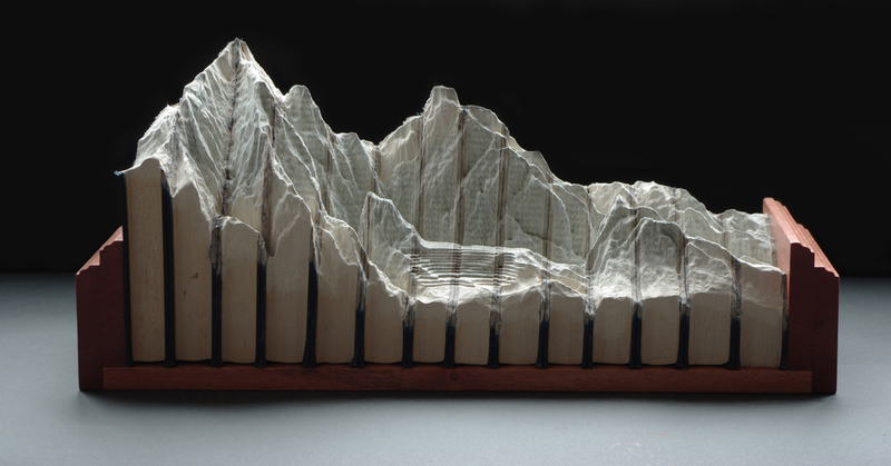 Illustration for article titled Insanely Detailed Book Sculptures Should Be Featured In National Geographic